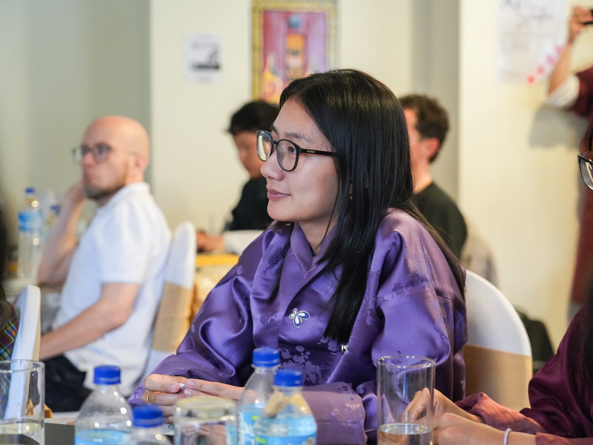 Participants listening during a session at AI Studio