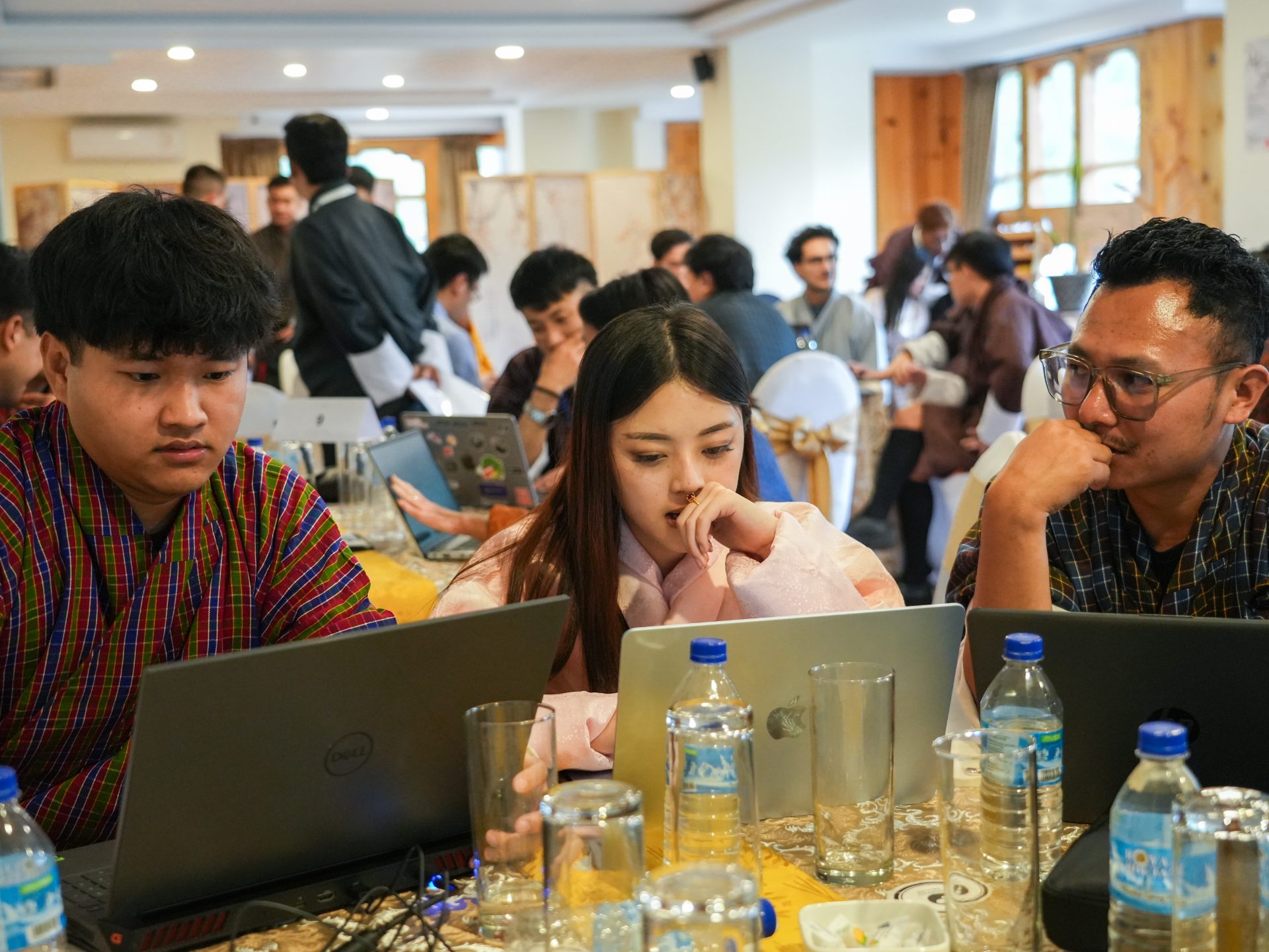 Teams building together during the lightning hackathon at AI Studio